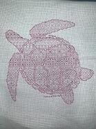 Cross stitch square for Alexis Holmgren's quilt